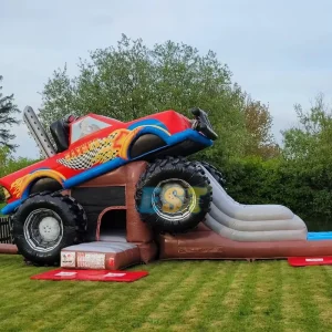 Kombinasi Bouncer Inflatable Komersial Kastil Bouncy Lompatan Bouncy Truk Monster untuk Anak dengan Seluncuran Air