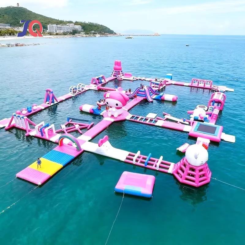 Isola galleggiante commerciale rosa gonfiabile personalizzata Parco acquatico PVC Scivolo d'acqua gigante Trampolino Percorso ad ostacoli Divertimento
