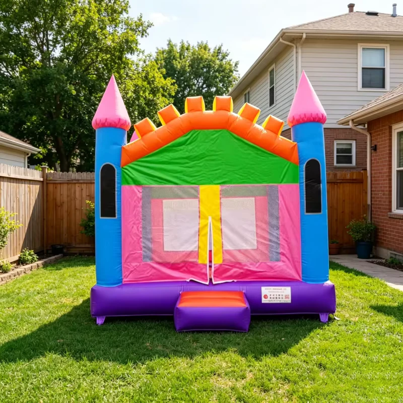 Castillo inflable estilo castillo multicolor para niños, castillo saltarín de PVC con pared de malla de seguridad para el jardín de casa