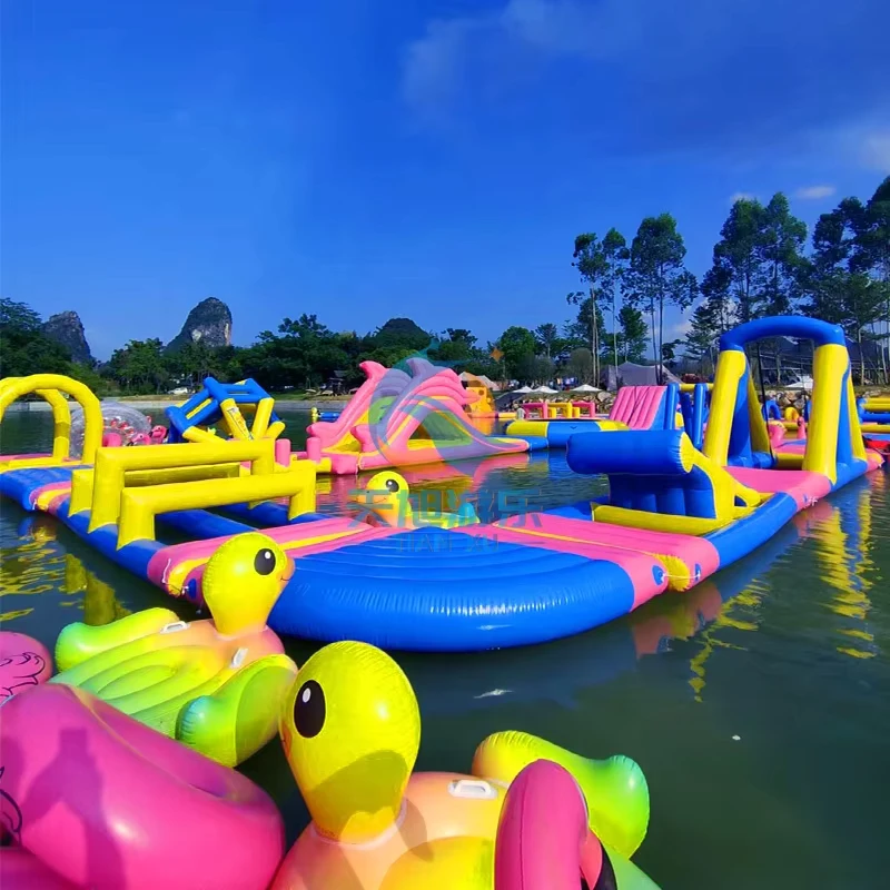 Jogos Aquáticos Infláveis Temáticos de Arco-Íris para Exterior, Grande Unicórnio Flutuante de PVC Durável para Praia, Capacidade de 500kg